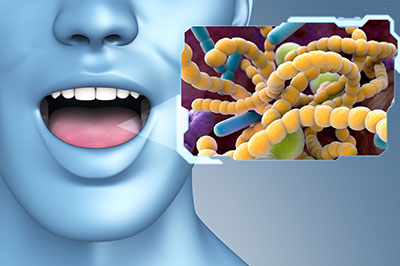 The image shows a human mouth with an open mouth, superimposed over a microscopic view of bacteria or viruses.